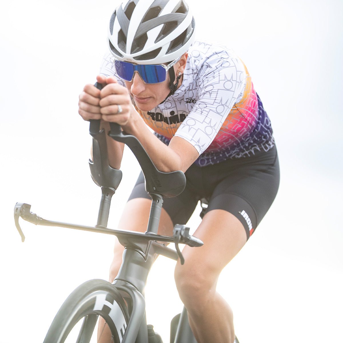 female riding in CYCLE JERSEYS Women's Ltd Cycle Aero Jersey - IM Endurance